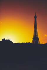 Fototapeta na wymiar Cityscape of Paris, France and famous landmark Eiffel tower in silhouette just before sunset.