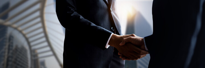 Business people shaking hands, close up hand shake of successful negotiate businessman agreement...