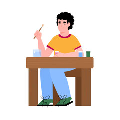 Fototapeta premium Kindergarten or preschool age child drawing sitting at desk, flat cartoon vector illustration isolated on white background. Children art education and creativity.