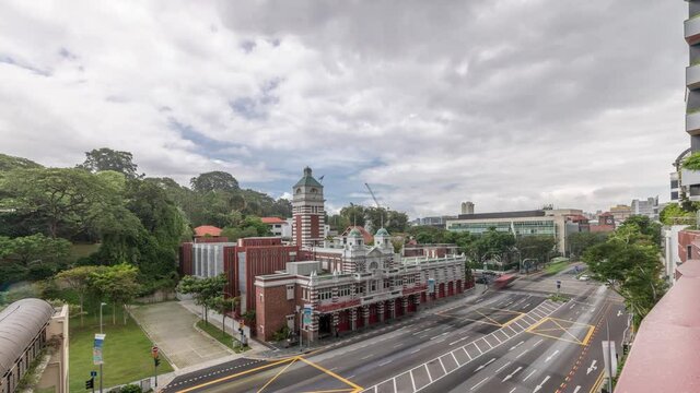 Street traffic near the fire station of Singapore aerial timelapse. The Central Fire Station is the oldest existing fire station in Singapore on Hill street