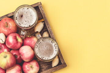 Mug of Cold Apple Cider and Ripe Apples Autumn Drink Top View Horizontal Copy Space