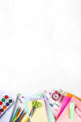 Back to school concept. Flatlay on white background with various school office supplies and stationery, top view copy space