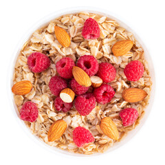 bowl of oatmeal with raspberries and almonds isolated on white background top view