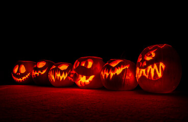 Carved Pumpkins for Halloween with Interior Candle Light.	Autumn Seasonal Holiday