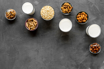 Vegan non-diary milk. Alternative types of milk with nuts and oat