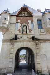 Old city gate 'La Lieutenance' in harbour basin 'Le Vieux Bassin'. Honfleur, Normandy, France. Gate - one of two entrances to medieval village, vestige of former home (17C) of governor of Caen.