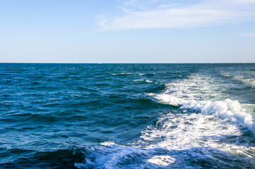 Beautiful horizon on the sea. Waves. Sunny day at sea.