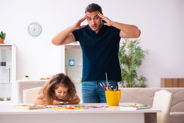 Young father and little girl indoors