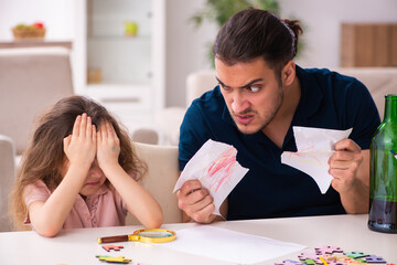 Drunk father and little girl indoors