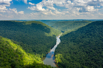 Cheat River makes its way through narrow wooded gorge towards Cheat Lake near Morgantown, WV - Powered by Adobe