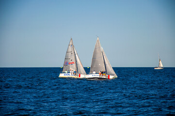 Fototapeta premium White sail on the sea. Sailing. Sailing competitions.