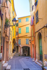 Fototapeta na wymiar Colorful buildings in the mediaeval town of Menton, French Riviera city in the Mediterranean, France.