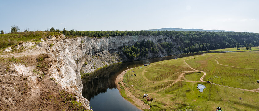 White rock on the Zilim river Bashkortostan Russia, the river flows at the foot of the white rock, panorama of mountains, nature of Russia, summer landscape, rock Aktash