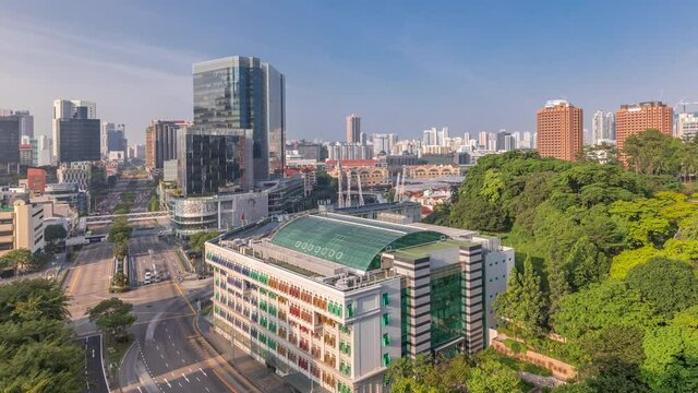 Morning view over Old Hill Street Police Station historic building in Singapore aerial timelapse. Skyscrapers, Fort Canning Park and Clarke Quay on a background. Neoclassical style building with