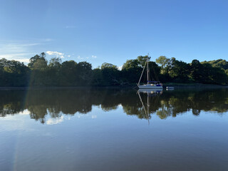 Fototapeta premium Boat reflection on the river 