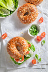 Delicious bagel with cherry tomatoes and mozzarella for healthy lunch