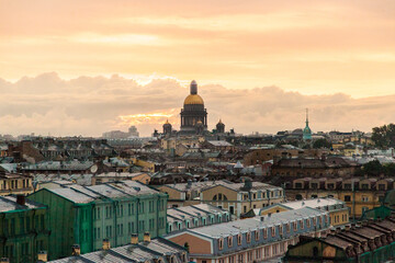 Fototapeta na wymiar Saint Petersburg suset cityscape with dome of Saint Isaac's cathedral