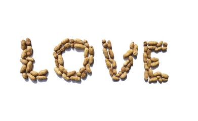 Love word written with Peanuts on white background in horizontal orientation, Perfect for Wallpaper