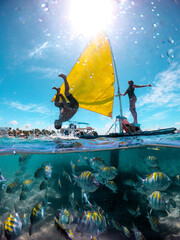 Young couple swimming in the natural pools in Porto de Galinhas Pernambuco - Brazil