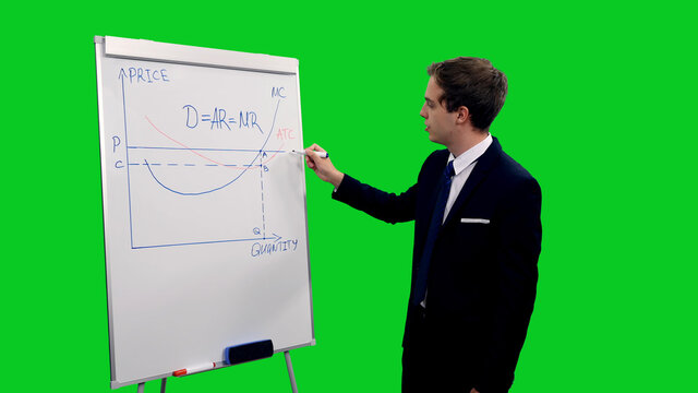 Young business coach explaining production function on white board during financial team meeting against green screen background, chroma key 