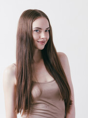 Naklejka premium Smooth hairstyle girl beautiful skin care portrait