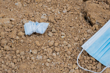 Used mask on the ground