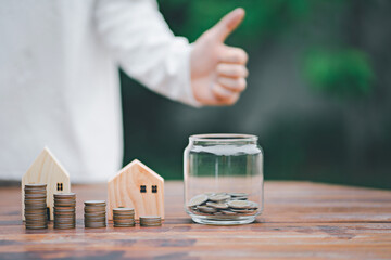 money stack with putting coins in jar step growing growth saving money, Concept finance business investment