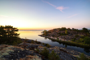 Obraz premium Panoramic view of coastal landscape after sunset