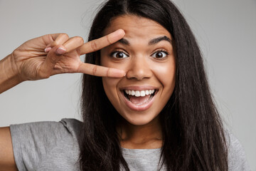 Portrait of a happy smiling young african woman
