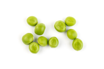 Green young peas, isolated on white background. Close-up. Top view