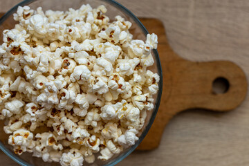 Popcorn in a glass bowl.