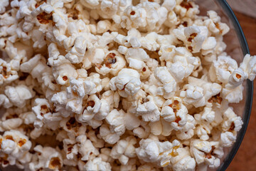 Popcorn in a glass bowl.