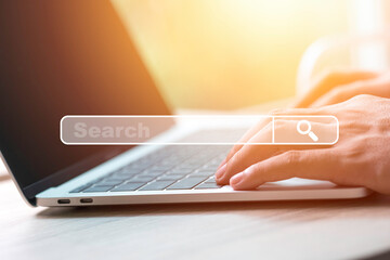 Searching browsing data information network concept. Businessman using laptop computer to input...