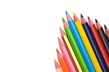 Obraz premium An arrow pattern made with some different wood pencil crayons on white background