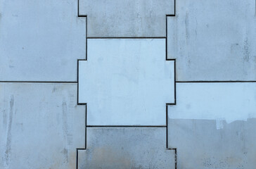 Texture in gray colors of a retaining wall of a road bridge