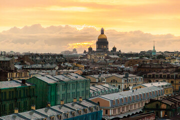 Fototapeta na wymiar Saint Petersburg suset cityscape with dome of Saint Isaac's cathedral