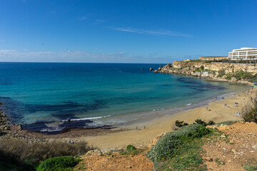 Naklejka na ściany i meble Golden Bay beach in Malta with beautiful blue ocean