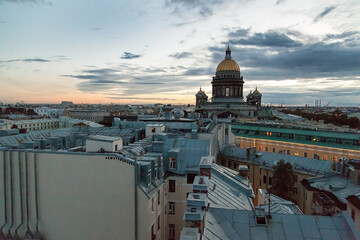 Rooftop cityscape of Saint Petersburg with St Isaac's cathedral in time of sunset
