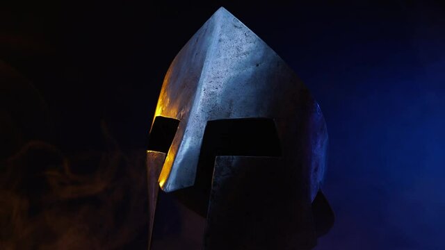 Spartan helmet moving in smoke.