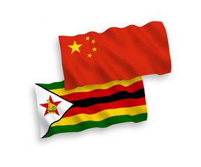 Flags of Zimbabwe and China on a white background