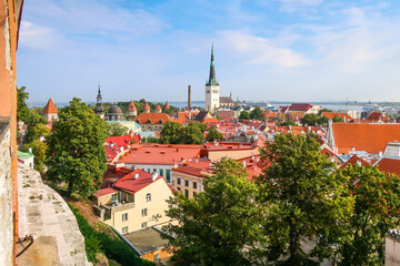 Fototapeta na wymiar Afternoon view overlooking the medieval walled city of Tallinn Estonia on a summer day in the Baltic region of Northern Europe.