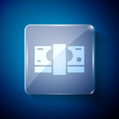 White Stacks paper money cash icon isolated on blue background. Money banknotes stacks. Bill currency. Square glass panels. Vector.