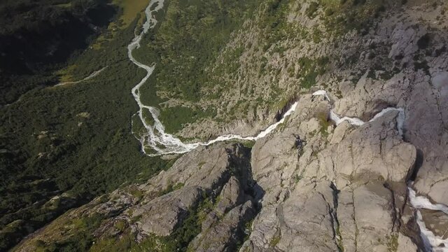 vue a&eacute;rienne de la sortie du Rhone de son lac glaciaire pr&egrave;s du glacier du Rhone dans les alpes suisses