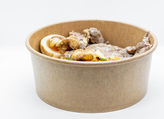 Closed up of take away rice box, lunch box in hard paper bowl on white background