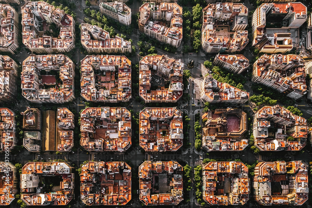 Wall mural Aerial view of typical buildings of Barcelona cityscape from helicopter. top view, Eixample residencial famous urban grid