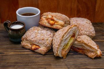 cheese, guava caramel and golden caramel puff pastries with coffee and milk