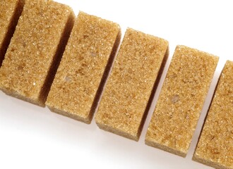 Brown Sugar, Cubes against White Background