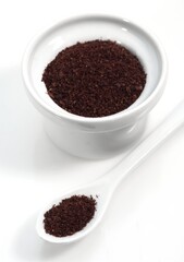 Powder of Sumac, rhus coriaria, Spice against White Background