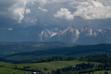 Fototapeta na wymiar Panorama of the Tatra Mountains with snow-capped peaks