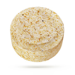 Yellow dishwasher detergent tablet isolated on white background